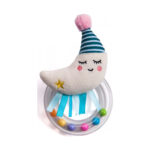 Бебешка мека дрънкалка Мини луна, Taf Toys: заспал бял полумесец със синьо раирана шапка с розов помпон, сини панделки и прозрачен пръстен с пъстри топчета.