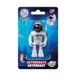 Интерактивна играчка Астронавт 7.5 см, Buki France: тъмносиня блистерна карта „Space Junior“ с бяла фигурка в скафандър с черен визьор и червени кантове и надпис „Astronaut“.