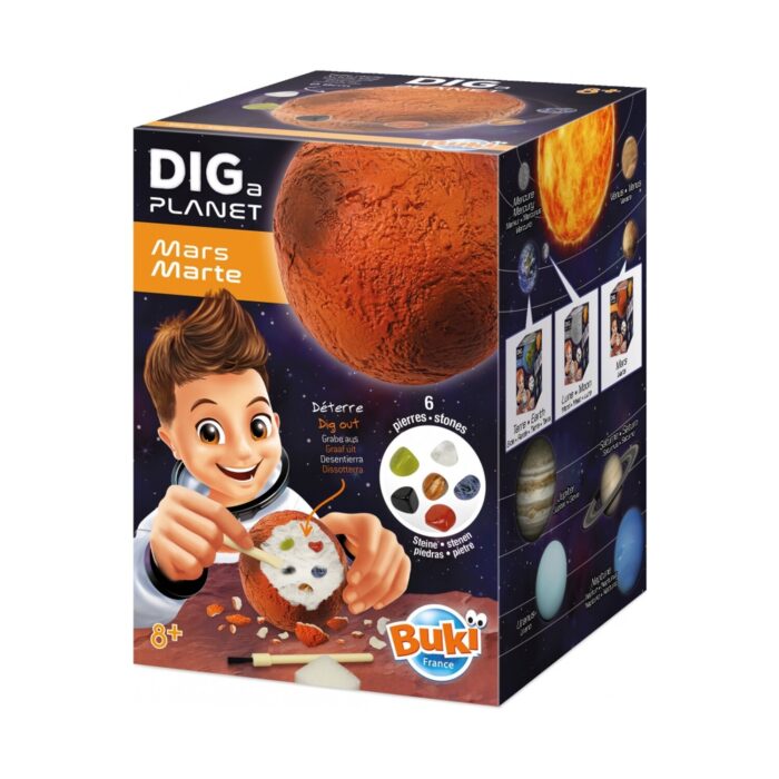 izsledovatelski-komplekt-izkopai-planeta-mars-buki-france-1500 Изследователски комплект Изкопай планета Марс, Buki France: черна кутия с ръждивочервена сфера, момче в скафандър с длето над разкопано кълбо с камъчета, шест цветни камъка и Слънцето с планетите на страничната стена.
