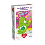Пъзел Care Bears Good Luck, 250 части, Lisciani: бяла кутия със зелено мече с четирилистна детелина на коремчето, кофа със златни звезди и надпис „Green is my LUCKY color“.