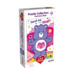 Пъзел Care Bears Harmony, 250 части, Lisciani: бяла кутия с лилаво мече с две розови сърца на коремчето върху розово-лилав фон и надпис „Stand out and SHINE!“.