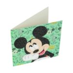 Творчески комплект диамантен живопис Мики Маус, Craft Buddy: сгъната картичка на ментовозелен фон с листа и зебри, на която мишокът е изписан с черни, бежови и бели кристалчета.