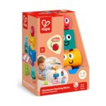 Игра за баланс Hape с карти в кутия, с цветни форми с очички на корицата