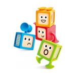 Четирите кубчета Hape с различни личица и цветни вендузи, свързани едно с друго